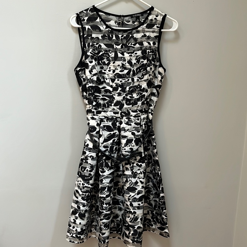 Black and white floral dress with overall and sheer upper chest